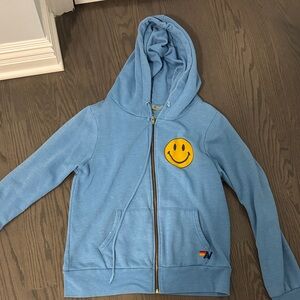 Blue smiley face aviator nation sweatshirt